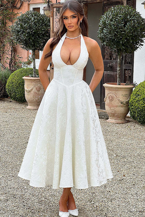 Women's evening floral midi dress, A-line, halter neck, and corset bodice for a refined look.