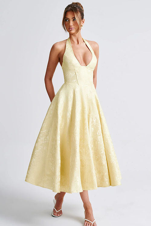 Romantic floral wedding guest midi dress, featuring a trendy halter and elegant corset.