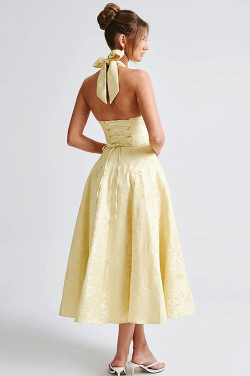 Fashionable floral print midi dress, ideal for special occasions, with a halter and corset top.