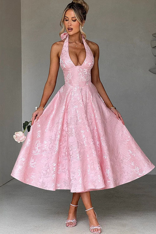 Stylish women's floral midi dress with a corset top, halter neck, perfect for garden parties.
