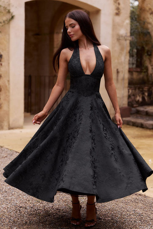 Delicate floral print midi dress, A-line cut, with a sophisticated halter and corset bodice.