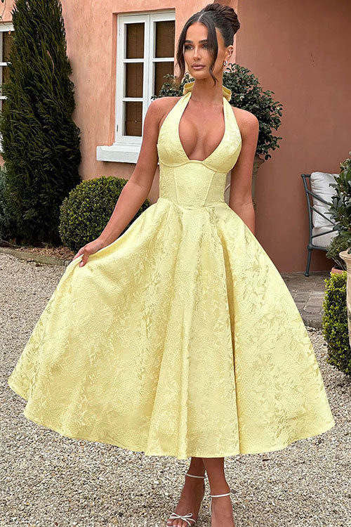 Trendy floral midi dress, ideal for special occasions, featuring a chic halter & corset.