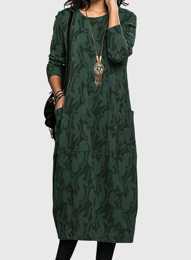 Elegant women's floral jacquard midi dress with convenient pockets, perfect for versatile fall and winter fashion.