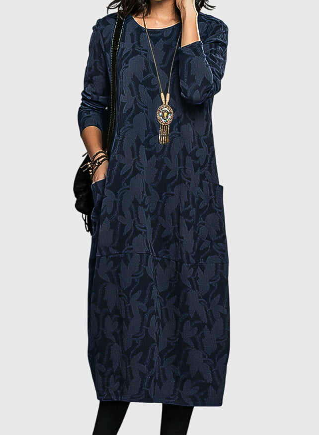 Luxurious jacquard midi dress for women, adorned with a beautiful floral pattern and essential pockets for fall elegance.