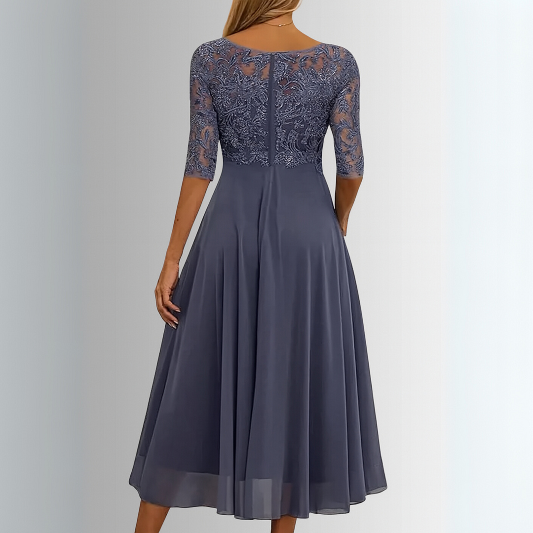 Stylish women's floral lace midi dress. Perfect for looking elegant at special occasion events.