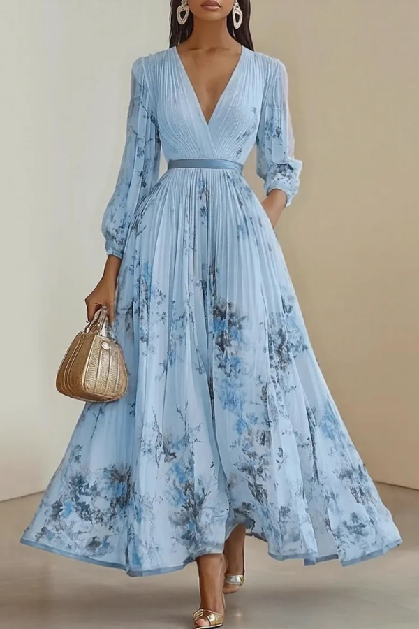 Flowy women's floral long sleeve maxi dress with adjustable waist, ideal for comfortable elegant styling.