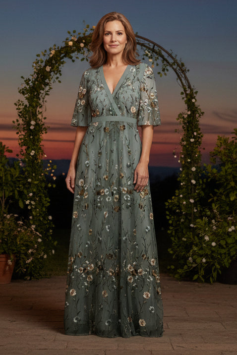 Elegant women's floral maxi dress for spring and summer events. Long, flowing fabric with vibrant flower print.
