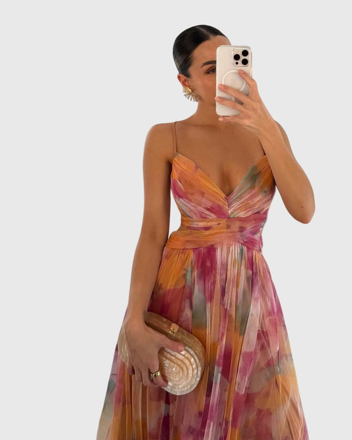 Flowy high-waisted women's boho floral maxi dress, comfortable for summer, beach, and vacation.
