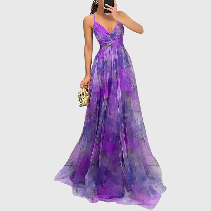 Women's elegant floral print maxi dress with adjustable straps, a versatile summer and beach outfit.