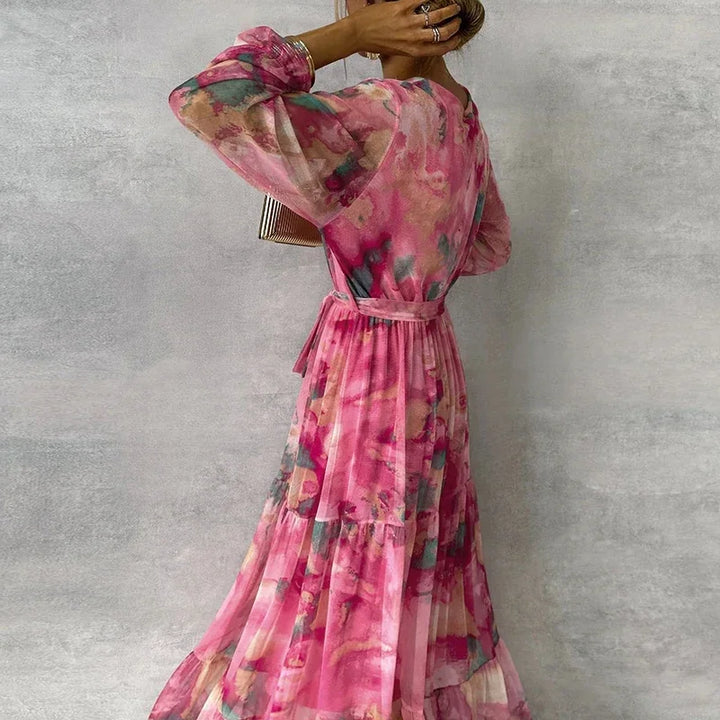 Women's classic elegant floral maxi dress, a stylish long flowing gown ideal for summer events.