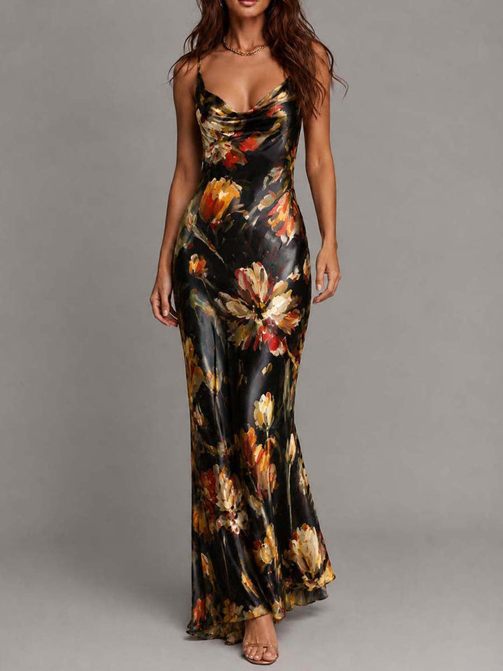 Graceful women's floral maxi dress in a flowing bias cut, with an elegant cowl neck and thin spaghetti straps.