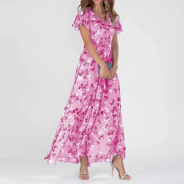 Chic women's floral maxi dress with flutter sleeves and V-neck. Perfect elegant party dress for spring & summer.