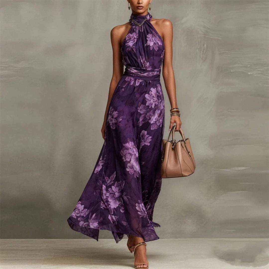Stunning floral print women's maxi dress. Elegant sleeveless design, halter neck, and ruched waist.