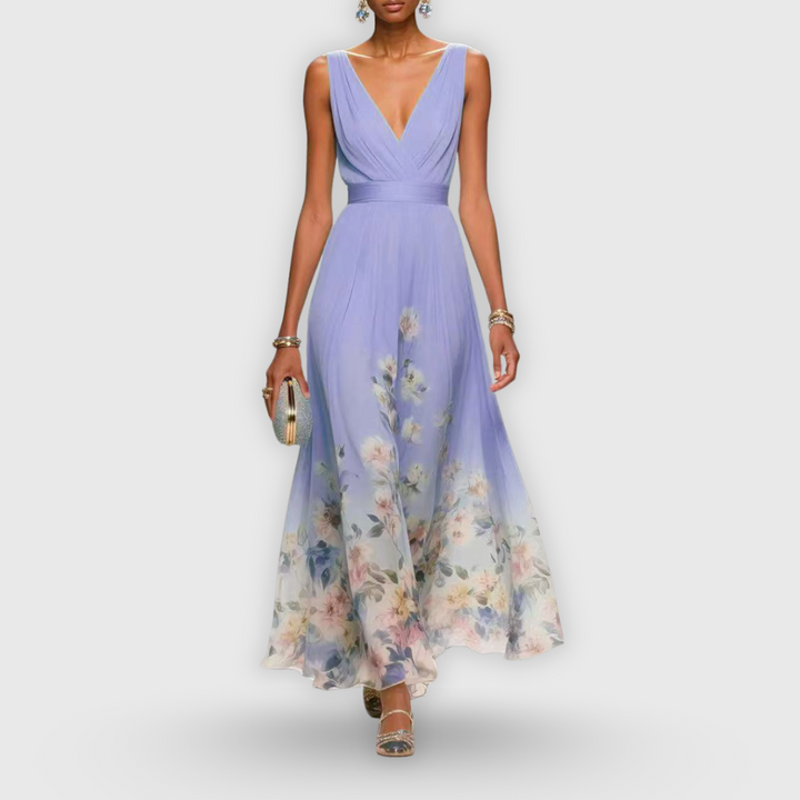 Flowy long floral maxi dress for women with an elegant V-neck and sleeveless cut, great for special occasions.