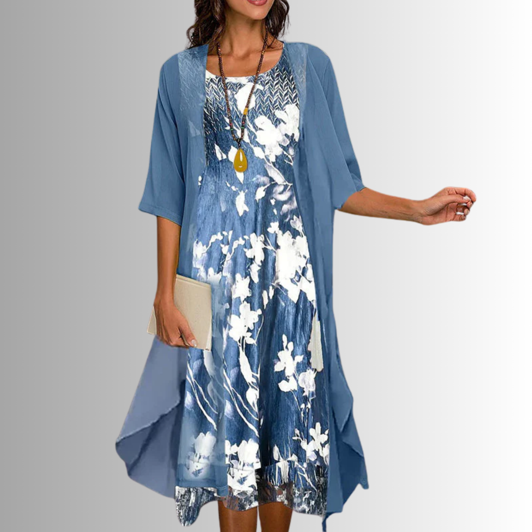 Chic floral midi dress and cardigan set. Women's elegant two-piece outfit, ideal for vacation or events.