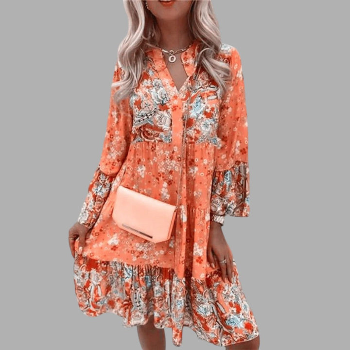 Beautiful women's floral midi dress with an elegant print. A comfortable & flattering choice for spring & summer events.