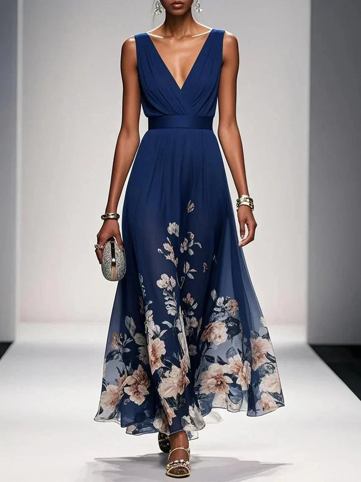 Chic women's floral print midi dress featuring a flattering deep V-neck and flowy silhouette.