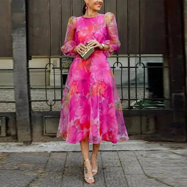 Elegant women's floral midi dress with long sleeves, perfect for a wedding guest, brunch, or special occasion.