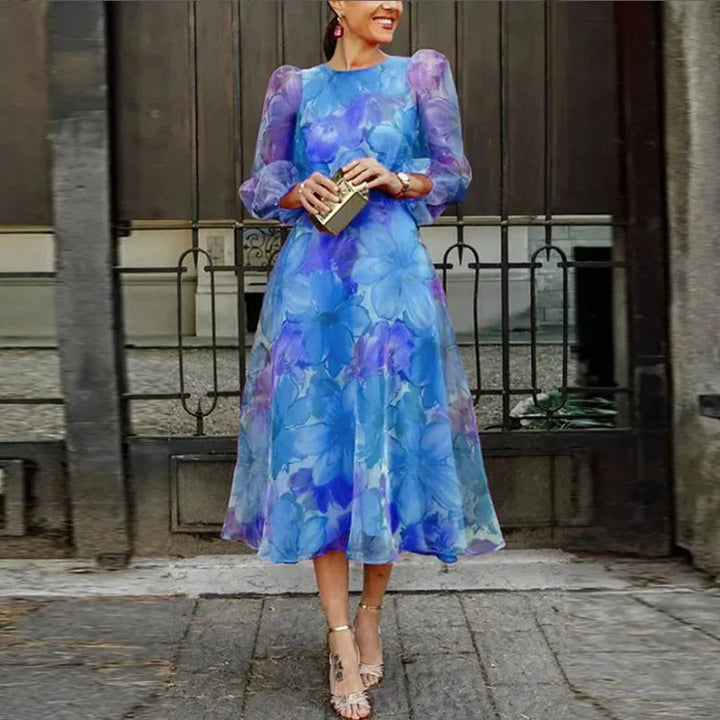 Romantic long-sleeve floral midi dress for women. Versatile casual or party wear, ideal for summer events.