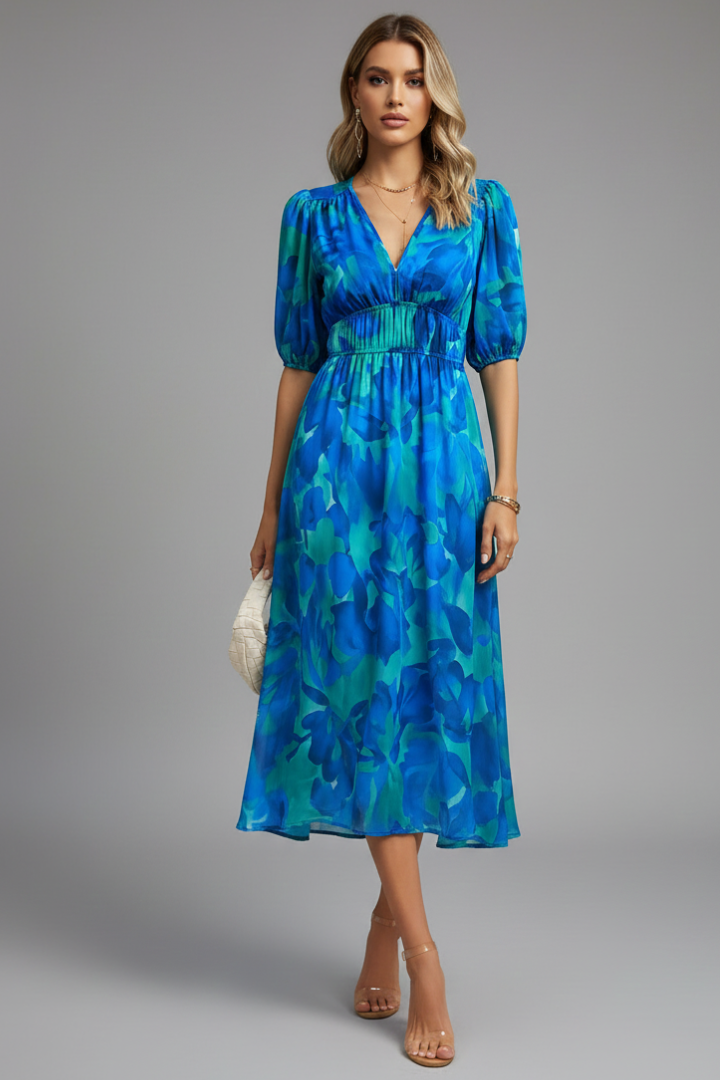 Stylish ladies' printed floral midi dress with puff sleeves & V-neck, ideal for casual or elegant wear.