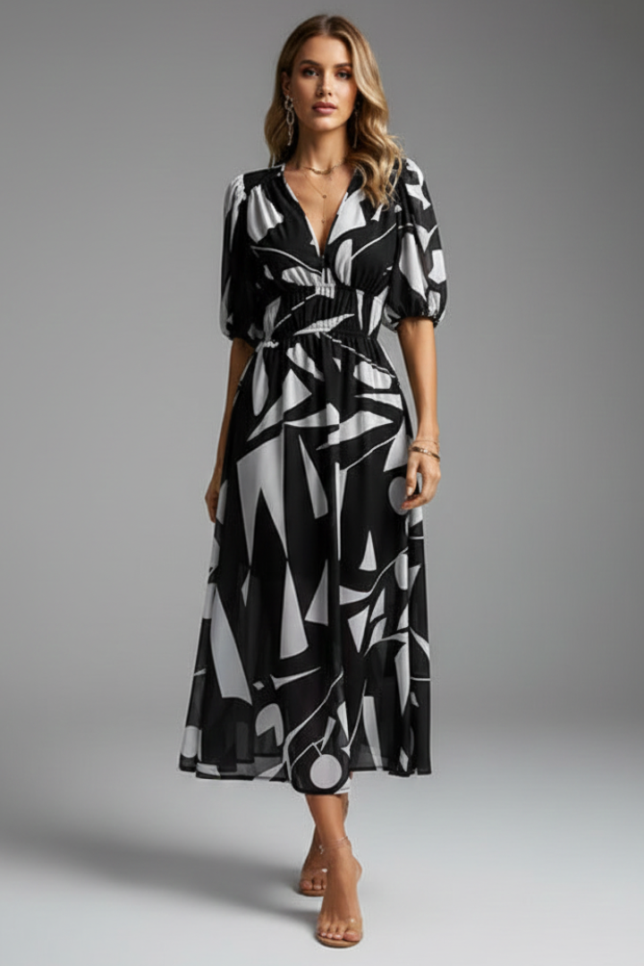 Comfortable women's floral midi dress with stylish puff sleeves, great for spring outings & everyday chic.