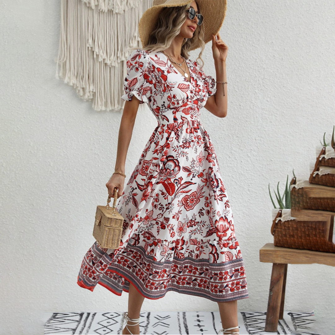 Feminine floral midi dress for women featuring charming puff sleeves & V-neck, ideal for summer parties & elegant wear.