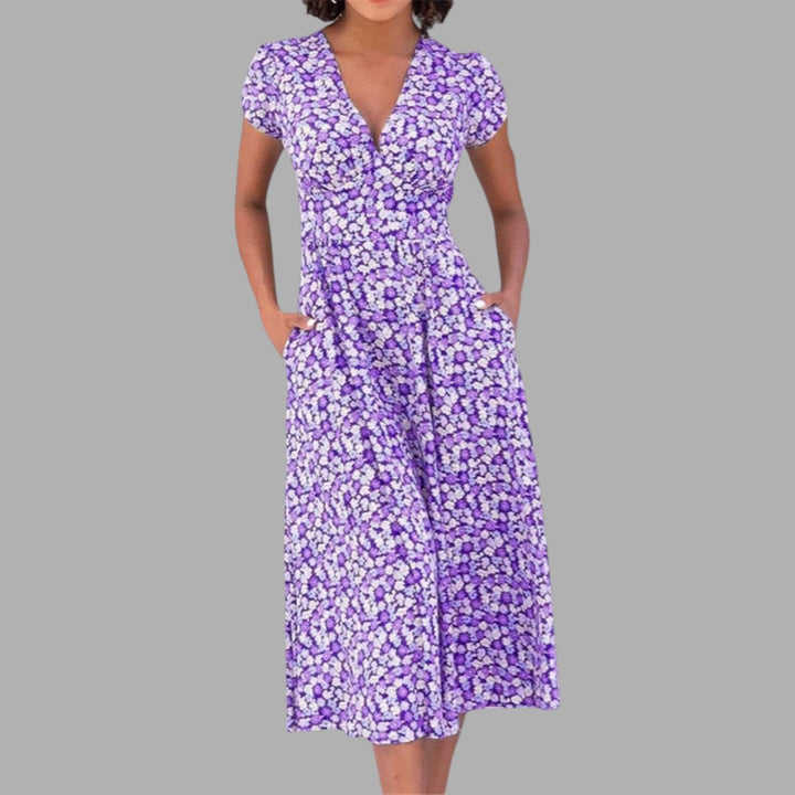 Comfortable V-neck floral midi dress for women, with elegant print and functional pockets for everyday style.