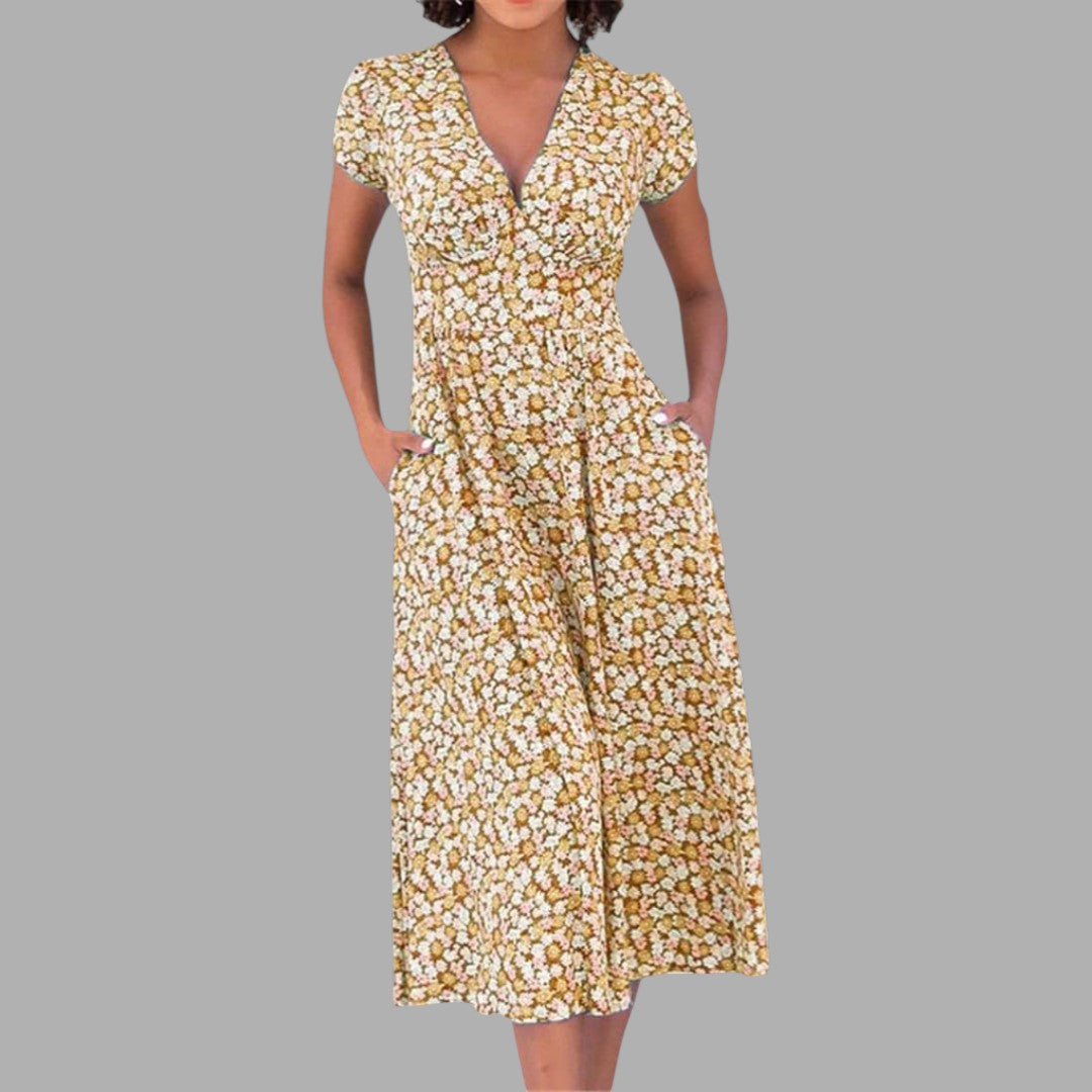 Chic women's floral V-neck midi dress, offering an elegant look with convenient pockets for spring and summer events.