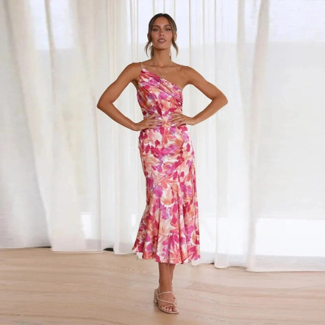 Graceful women's one-shoulder midi dress with vibrant floral print, suitable for summer weddings & parties.