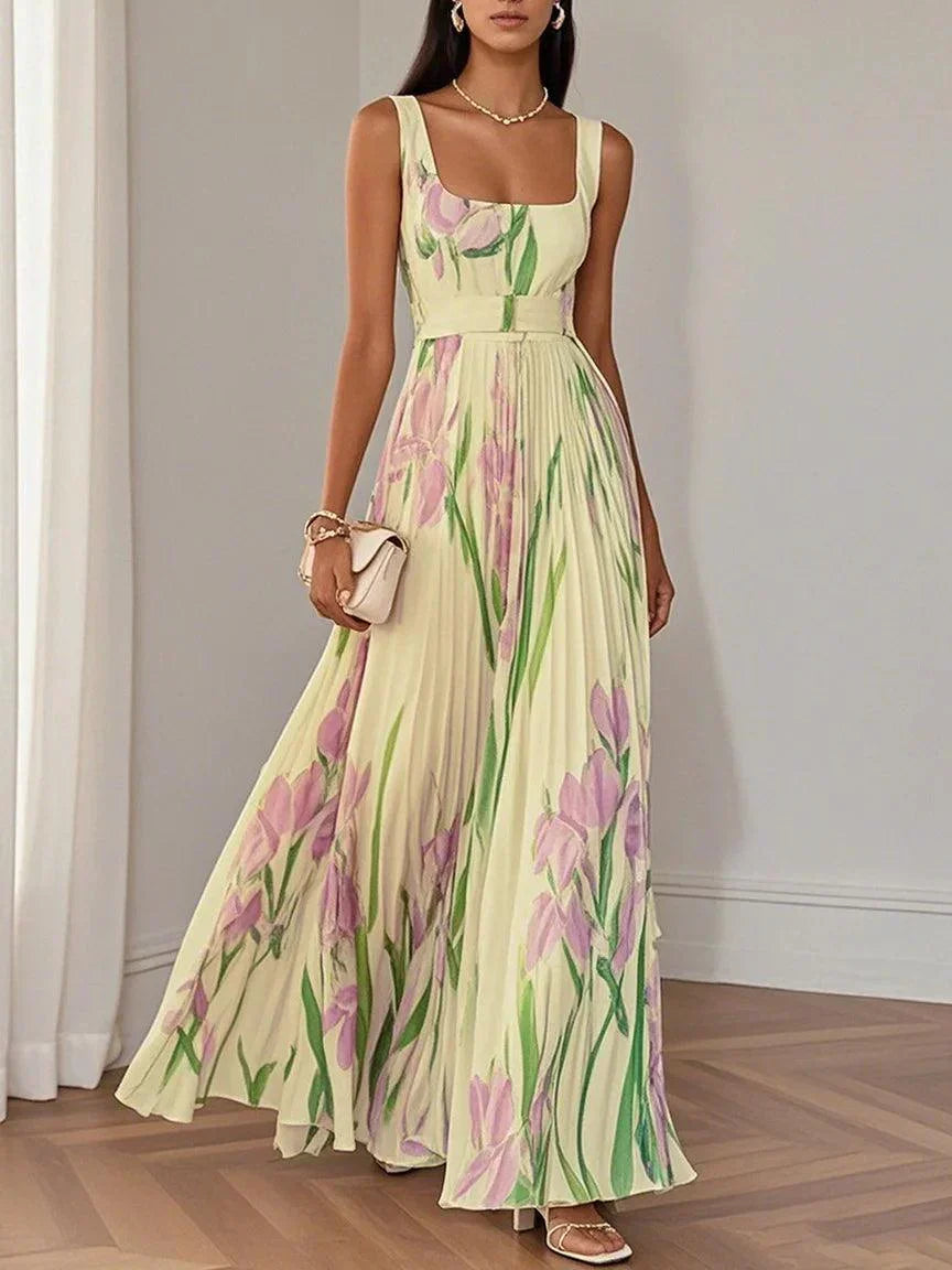 Formal floral pleated maxi dress for women with an elegant square neck. Perfect evening gown or wedding guest attire.