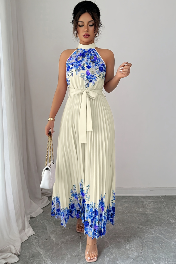 Chic women's square neck floral midi dress, featuring a flowy pleated skirt, perfect for spring.