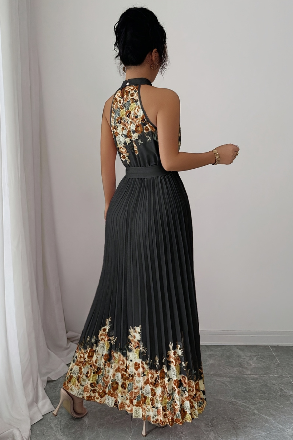 Elegant women's floral midi dress for vacation, with a pleated skirt and a square neckline.