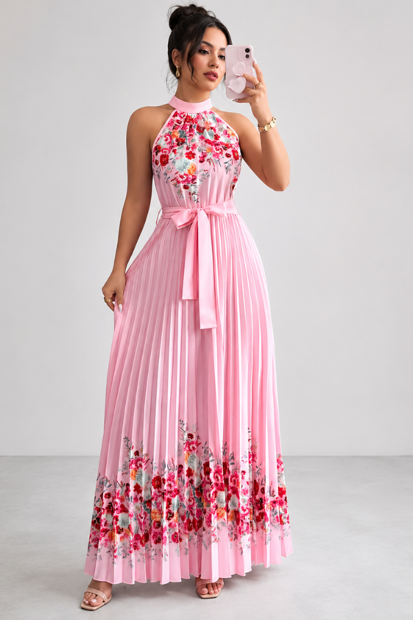 Flowy women's midi dress featuring a beautiful floral print and elegant pleats, ideal for brunch.