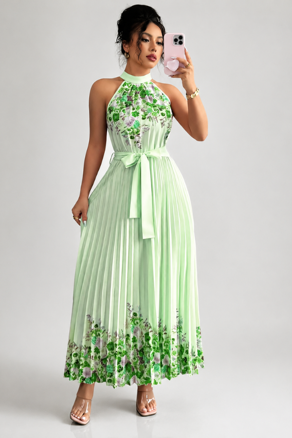 Sophisticated women's pleated floral dress with a flattering square neckline, suitable for elegant events.