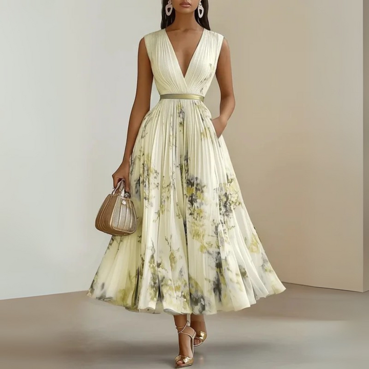 Graceful women's V-neck floral midi dress, sleeveless and pleated, ideal for special occasions.