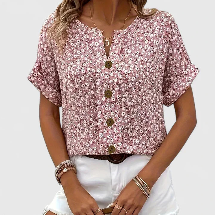 Chic floral button-up blouse for women, featuring a relaxed fit, ideal for versatile spring & summer fashion.