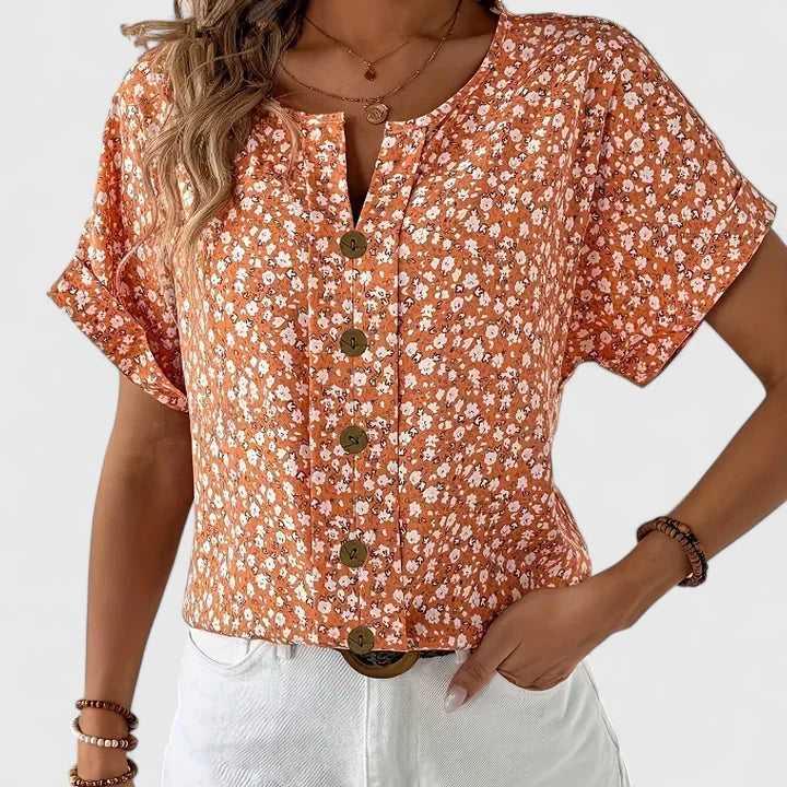 Women's relaxed fit floral blouse. An elegant & chic top for everyday style, suitable for office & casual wear.