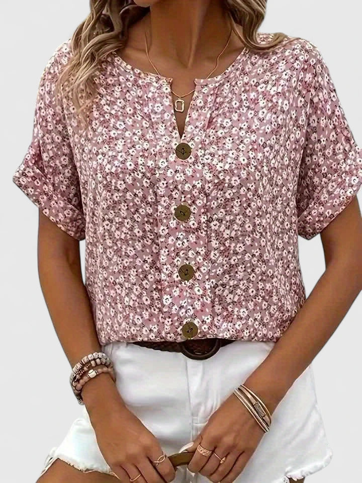 Beautiful women's floral print top. A stylish, flowy blouse with a chic design for spring & summer fashion.