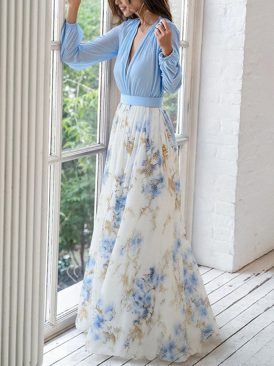 Flowing sleeveless floral maxi dress for women, featuring a V-neck, ideal for spring vacation & boho style.