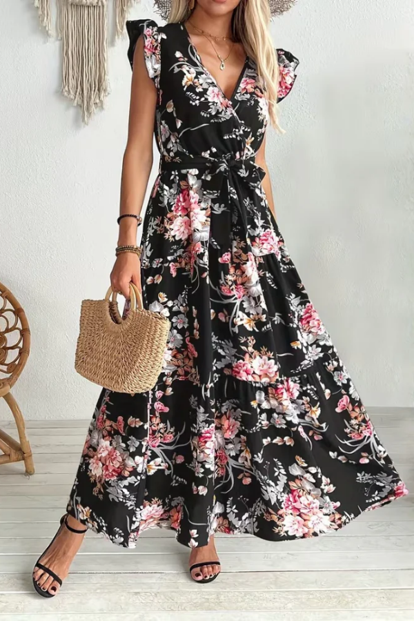Chic women's A-line floral swing dress. Features V-neck, ruffle sleeves & a stylish belt for summer.