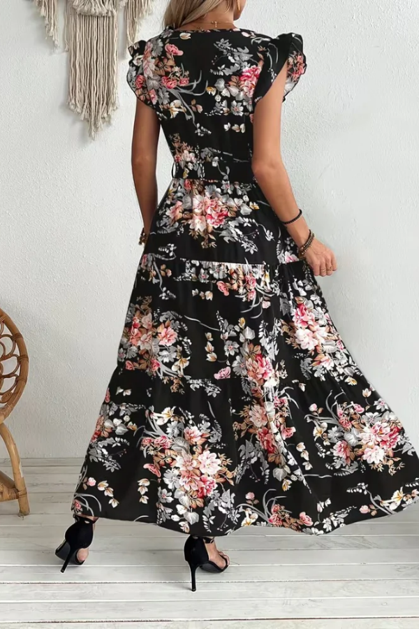 Lightweight women's floral print summer swing dress. V-neck, ruffle sleeves & belted waist for comfort.