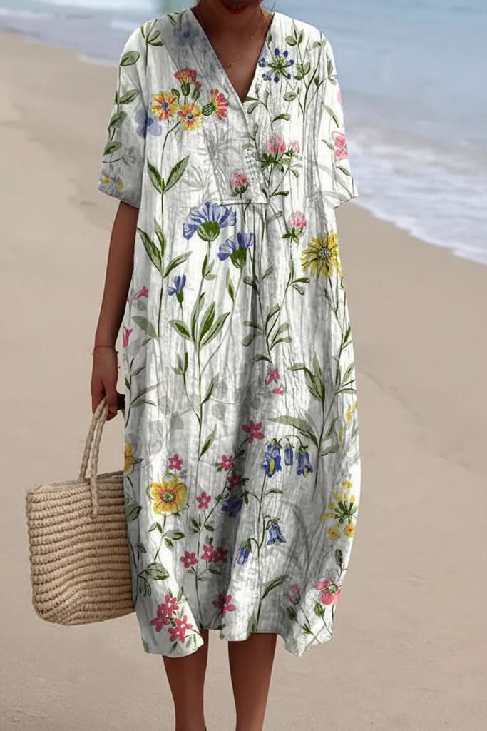 Women's elegant floral midi dress with V-neck, a comfortable choice for summer fashion.