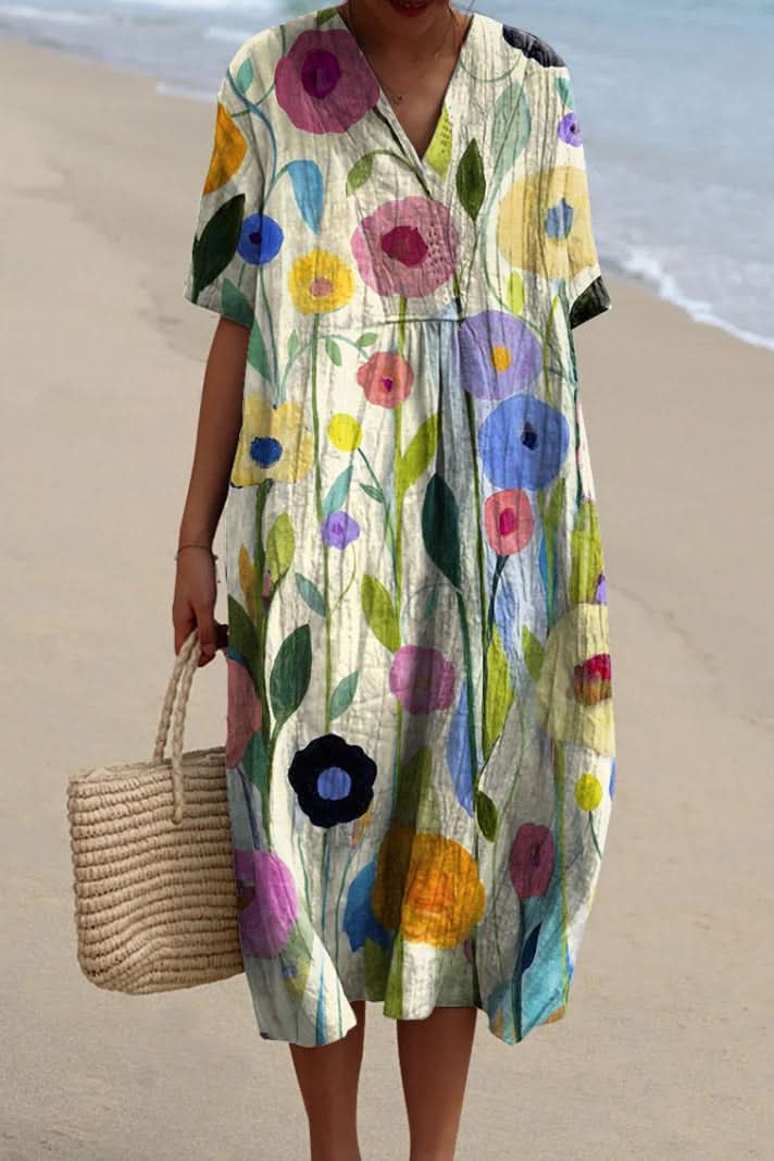 Stylish women's floral V-neck midi dress, perfect for a casual yet elegant summer look.
