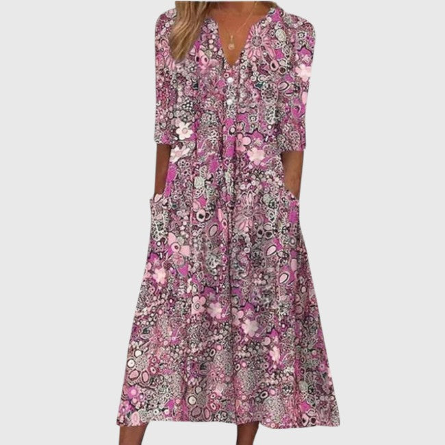 Stylish women's floral V-neck A-line midi dress, elegant and versatile for spring fashion and casual occasions.