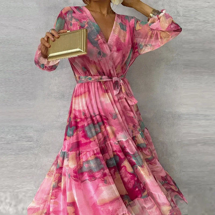 Chic long sleeve floral maxi wrap dress for women. A beautiful V-neck wedding guest or elegant party dress.