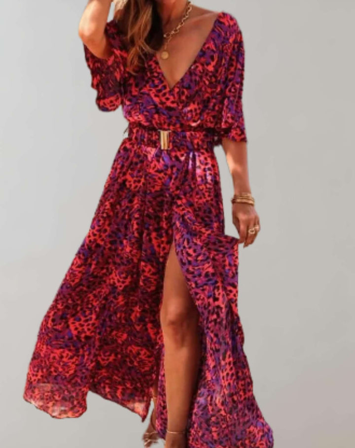 Vibrant floral print wrap maxi dress for women, featuring a flattering V-neck and a sophisticated side slit.