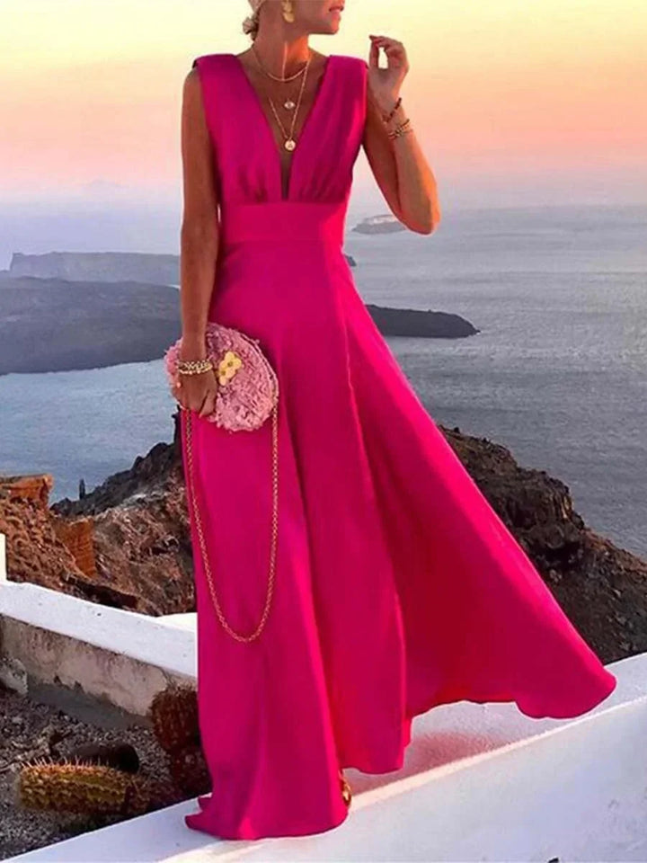 Elegant women's flowing deep V-neck maxi dress, perfect for evening wear or a summer party.