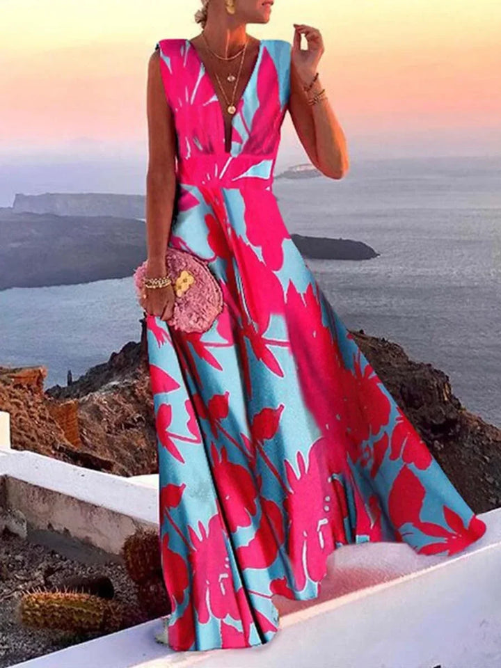 Stunning red flowing deep V-neck maxi dress, an elegant women's formal or party dress.