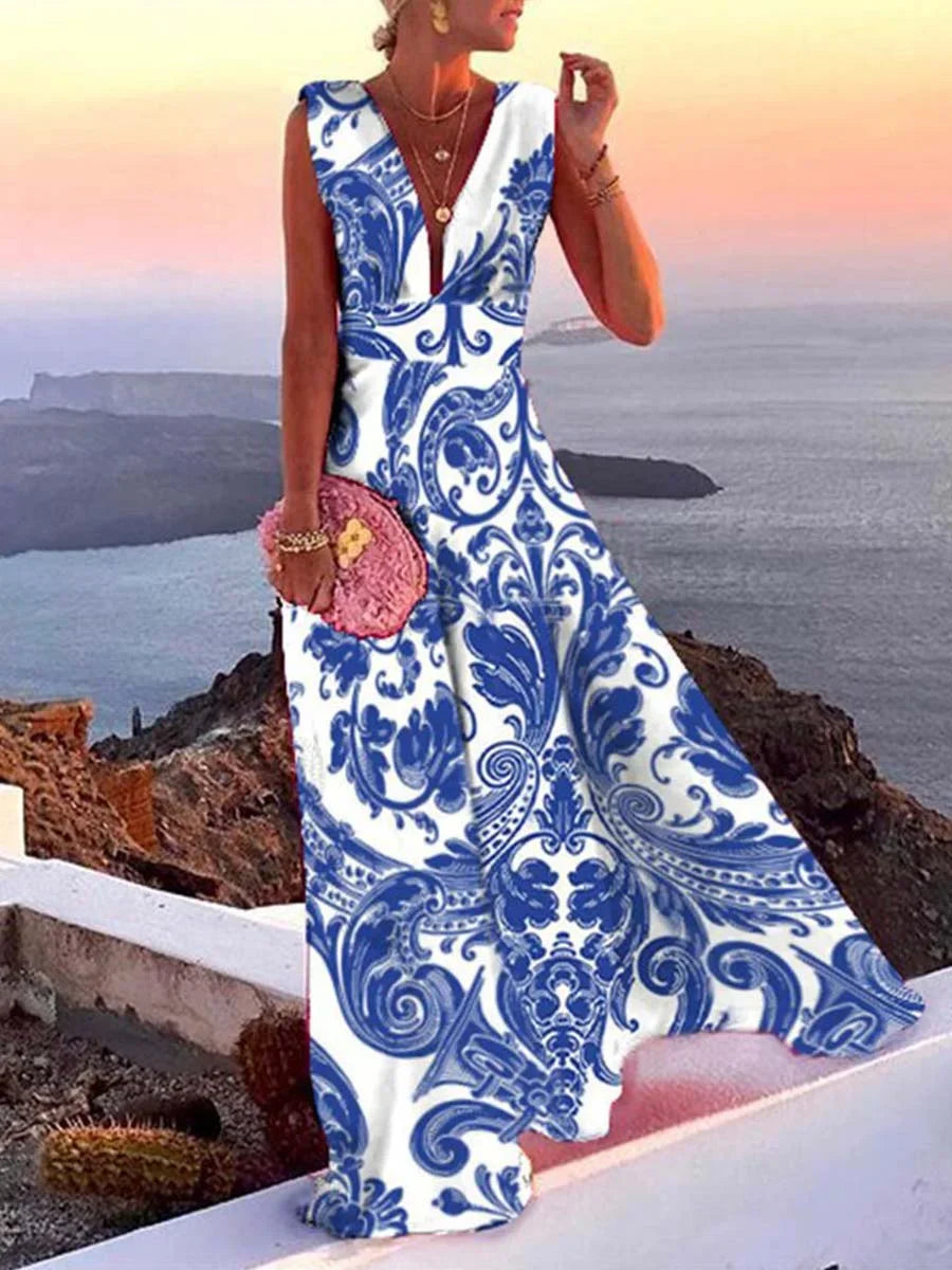 Chic blue flowing deep V-neck maxi dress for women, perfect for elegant evening events or resort wear.
