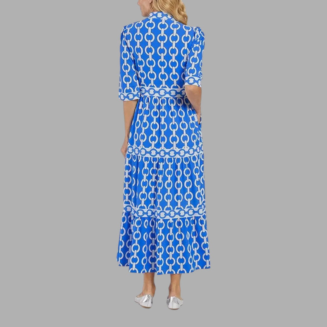 Relaxed fit women's long maxi dress, featuring elegant flowing fabric. A comfortable and versatile summer wardrobe essential.